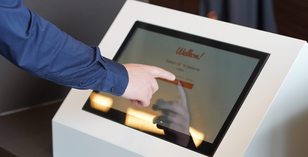 The visitor management kiosk can expedite the guest registration.